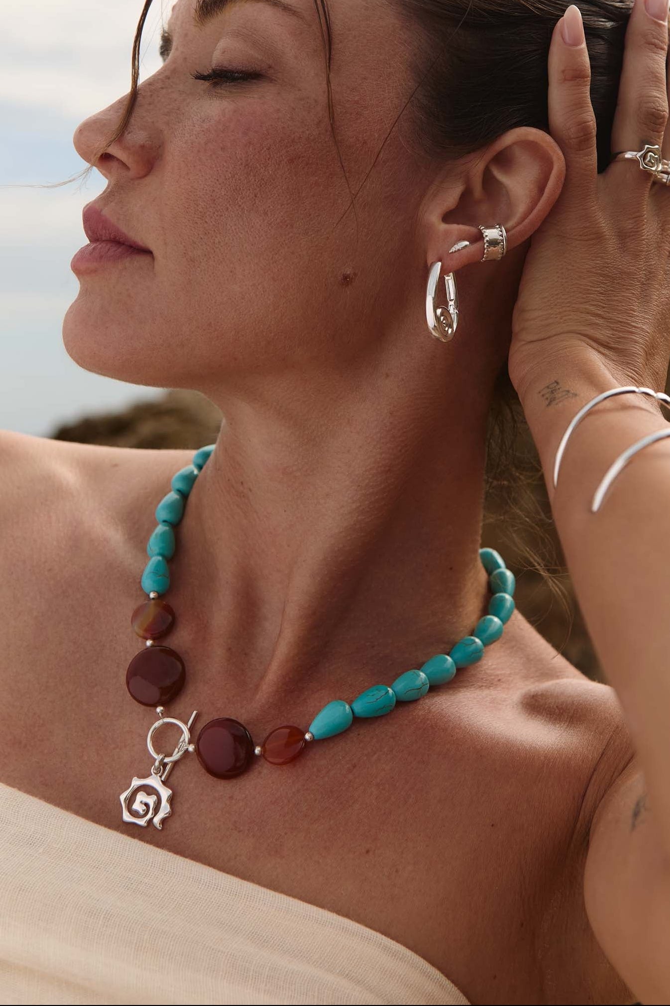 Collar Sham Plata Cuatro