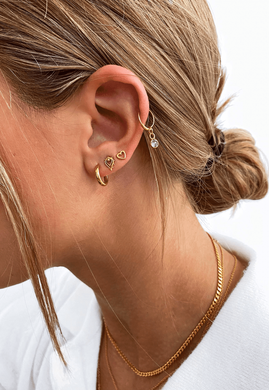 PENDIENTES MAYUR BAÑADOS EN ORO