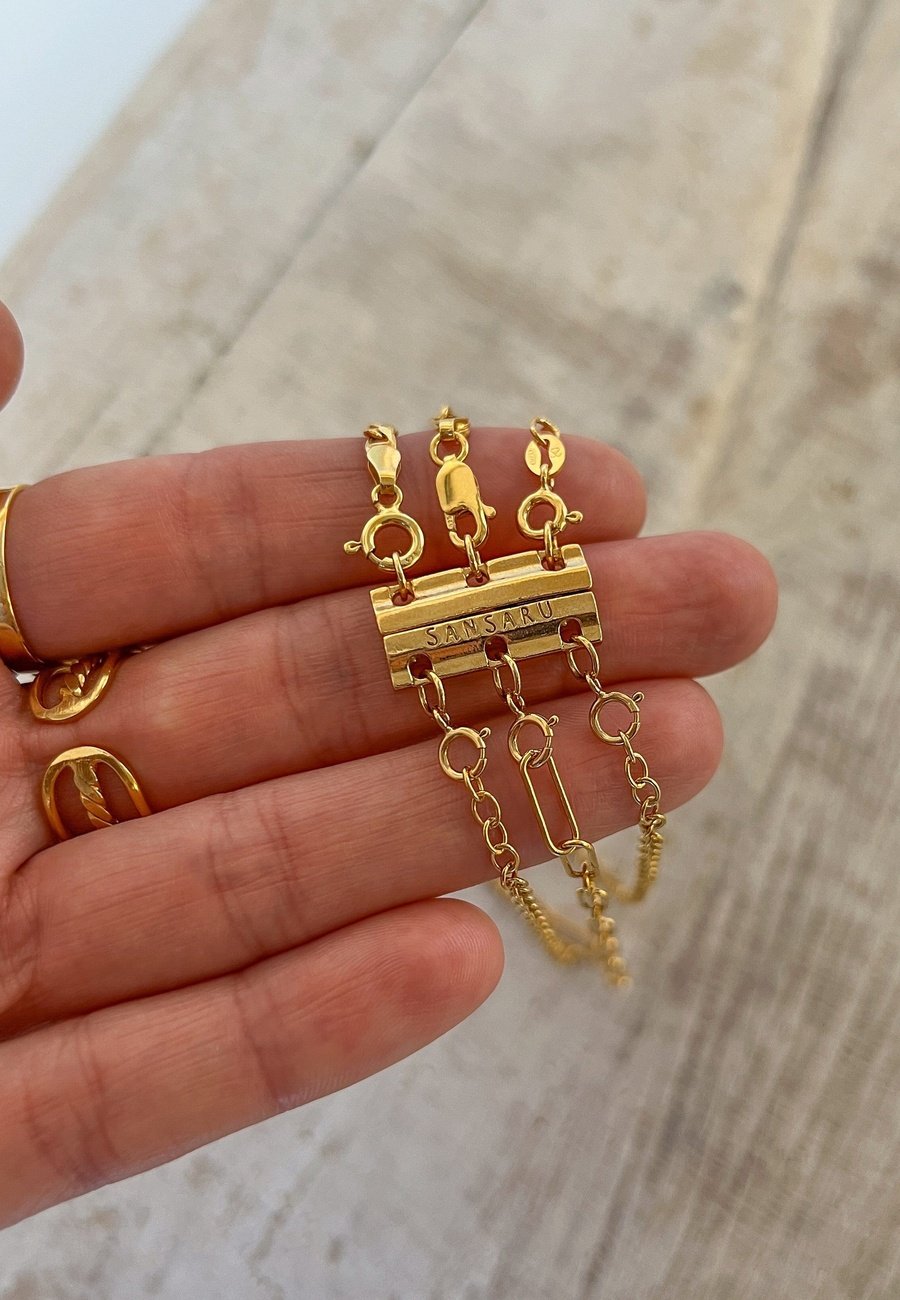 CIERRE PARA TRES COLLARES BAÑADO EN ORO