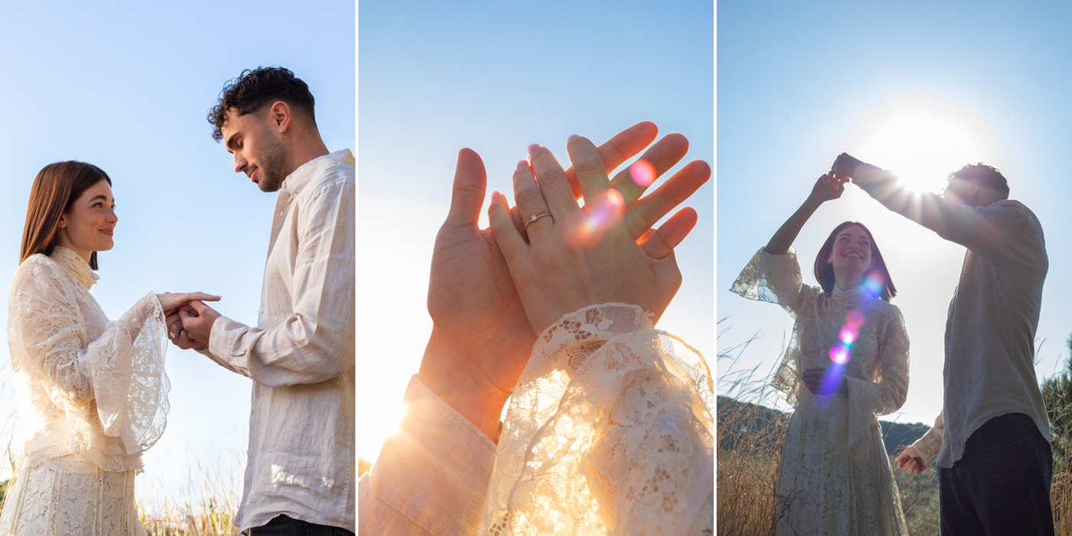 Novios en el campo con vestido de encaje y anillo de compromiso de oro de San Saru