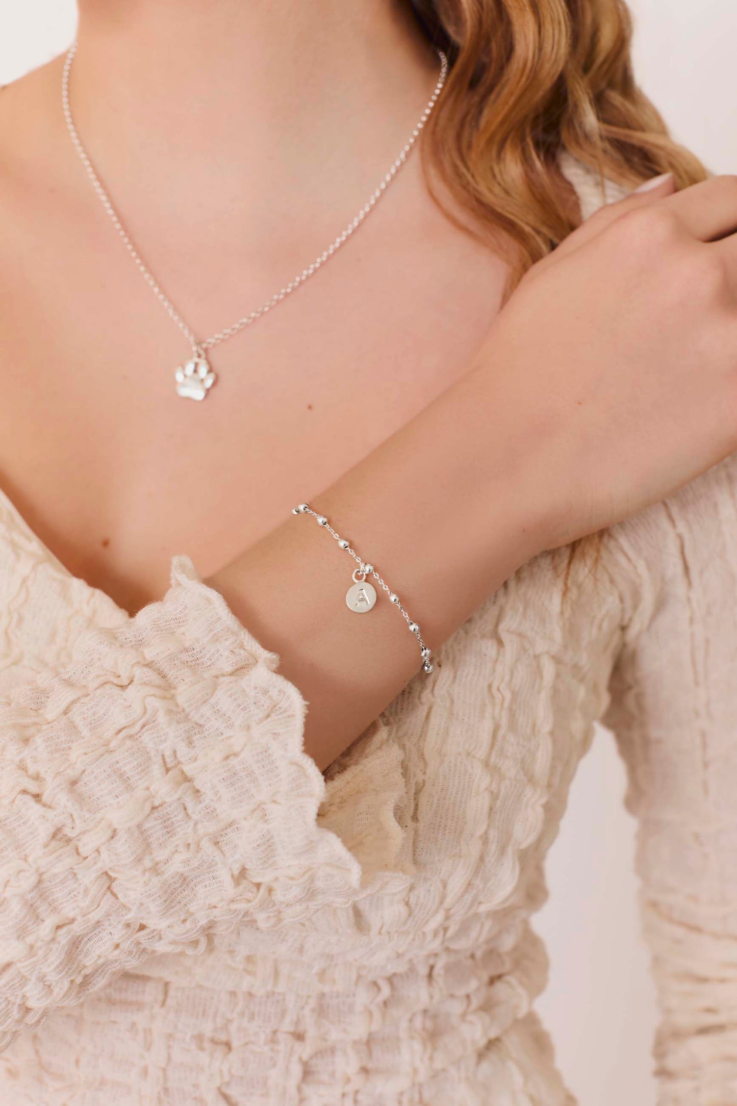 BRACCIALE ADAMYA LETTERA PIASTRA