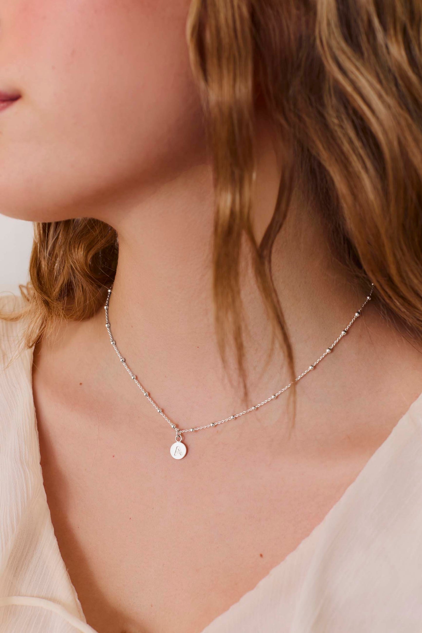 ANUK LETTER PLATE NECKLACE