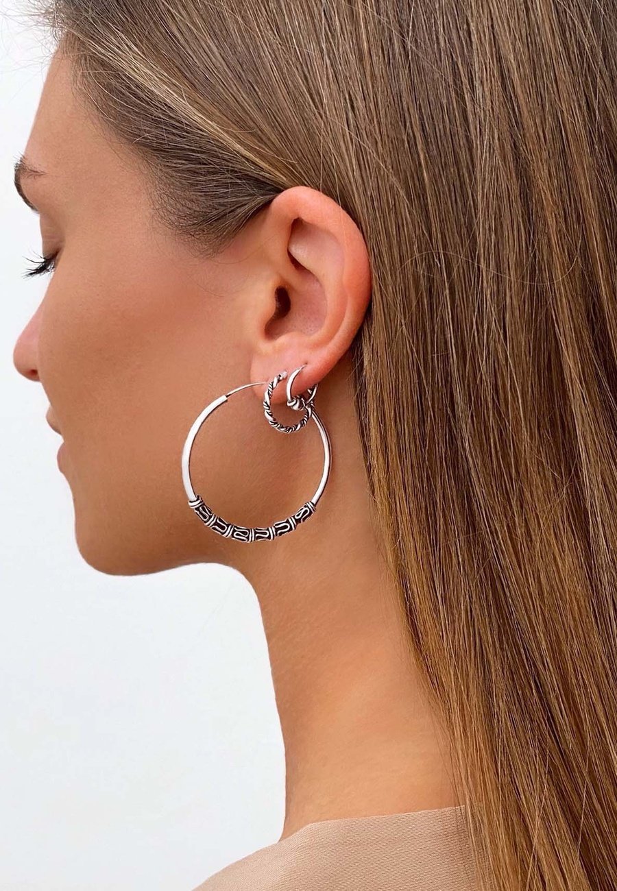 Large Oval Hoop Earrings in Silver | Glassons
